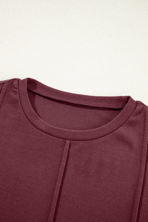 Judith Solid Exposed Seam Long Sleeve Top
